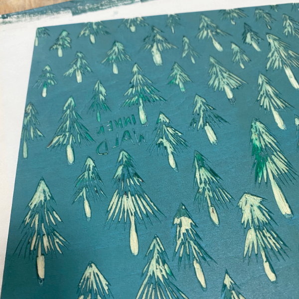 Applying the ink to woodblock print